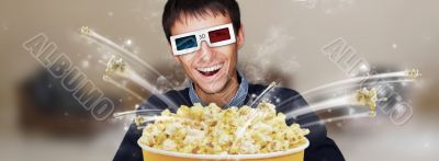 Portrait of young stylish modern man wearing 3d glasses watching