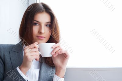 Portrait of beautiful young business woman wearing formal clothe