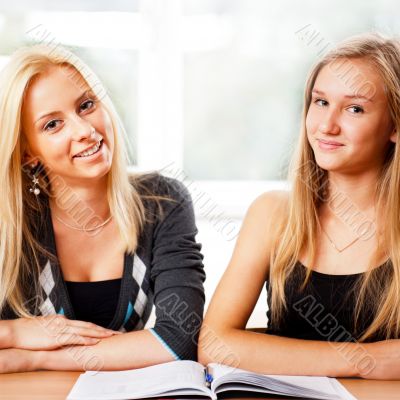 Portrait of a young group of students paying attention in class.