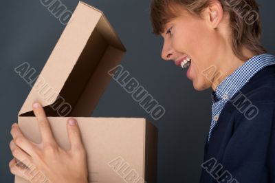 Portrait of handsome young man with Christmas gift