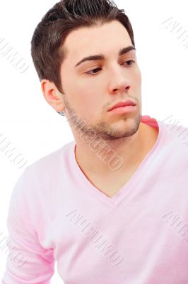 Fashion male portrait looking away deep in thought - isolated ov