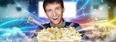Portrait of young stylish modern man watching movie at modern ci Portrait of young stylish modern man watching movie at modern ci