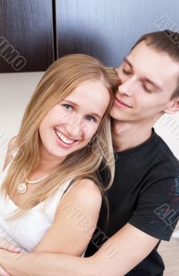 Portrait of a cute young couple enjoying themselves while prepar