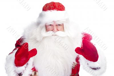 Christmas theme: Santa Claus bowing something from his arms