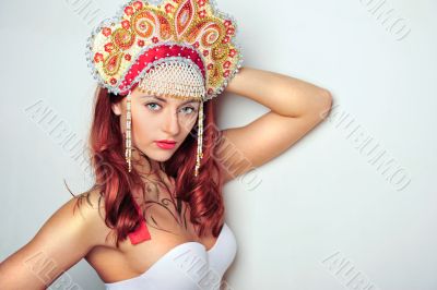 Closeup portrait of pretty young woman with red hairs