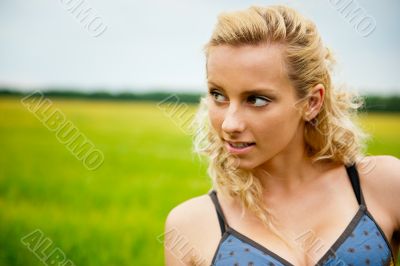 A portrait of a beautiful young Caucasian woman outdoor