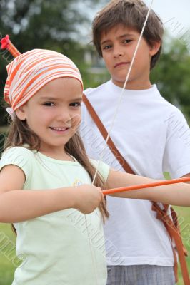 Children with bow and arrow