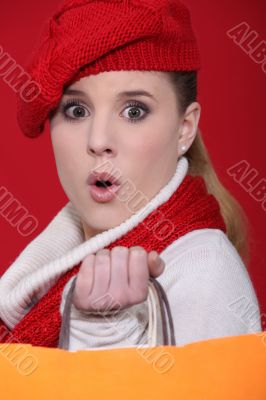 Shocked woman with shopping bags Shocked woman with shopping bags