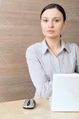Portrait of a beautiful young businesswoman working  on the comp