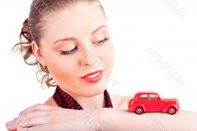 Closeup portrait of young pretty woman driving little retro car Closeup portrait of young pretty woman driving little retro car