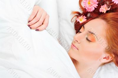 Closeup portrait of young beautiful caucasian woman with red hai