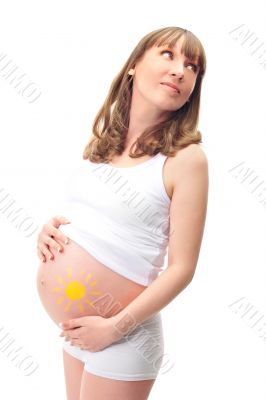 Image of pregnant woman touching her belly with hands