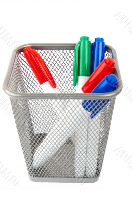 Markers for white board in basket isolated on a white background