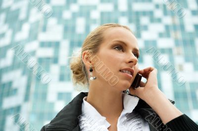 Portrait of pretty beautiful business woman on the phone with a 