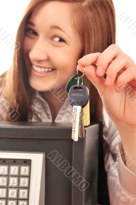 Closeup portrait of young pretty woman at her desk with deposit 