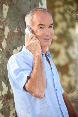 senior man at phone senior man at phone