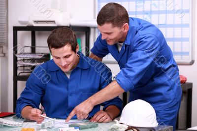 Manual workers in an office