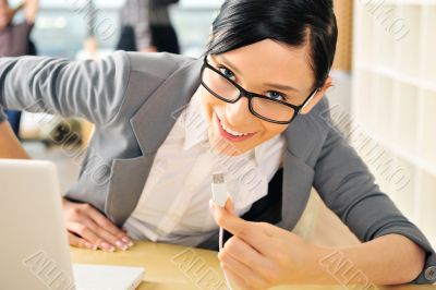 Closeup portrait of cute young business woman smiling