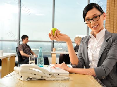 Closeup portrait of cute young business woman smiling at her wor