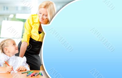 Young pretty teacher helping to her students to make exercise in