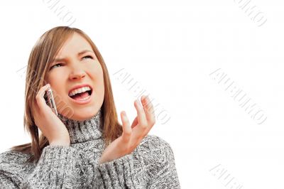 Closeup portrait of young woman talking using her cell phone and