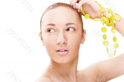 Portrait of a beautiful young woman looking to the left and hold Portrait of a beautiful young woman looking to the left and hold
