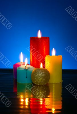 Five burning colourful candles