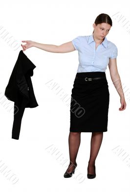 Frumpy businesswoman taking off her blazer