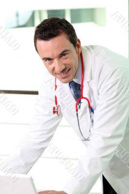 Male doctor in office