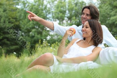 Couple sitting in the grass Couple sitting in the grass