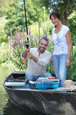 Couple in a fishing boat