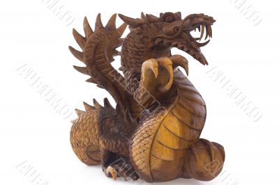 Wooden dragon, symbol of chinese new year, isolated on white background