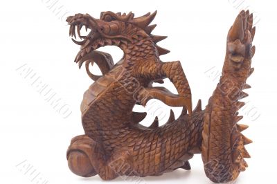 Wooden dragon, symbol of chinese new year, isolated on white background