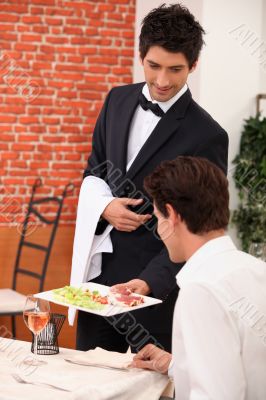 Smart waiter in restaurant