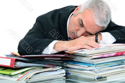 Man lying on paperwork
