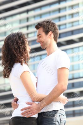 Couple hugging in the city