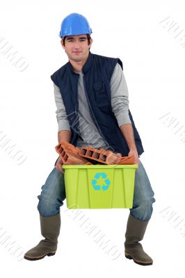 Man recycling bricks