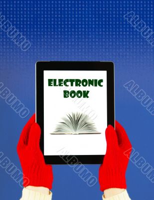 Hands wearing red gloves holding a tablet PC Hands wearing red gloves holding a tablet PC