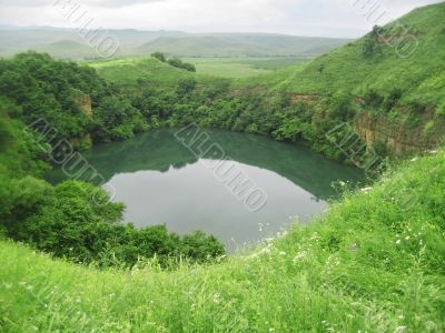 Small lake between the caucasus mountains summertime Small lake between the caucasus mountains summertime