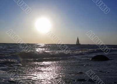 Lonely sail drifting under the big sun Lonely sail drifting under the big sun