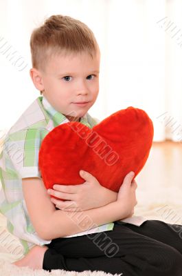 child with a plush heart
