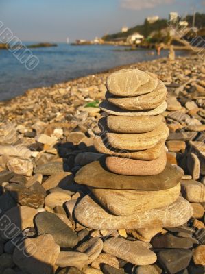 Balanced stones on the seashore