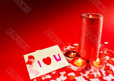 St. Valentine`s day greeting background with four burning candle