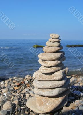Balanced stones on the seashore