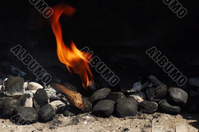 grill with coals and fire