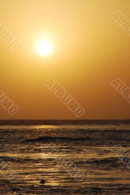 sunrise with waves