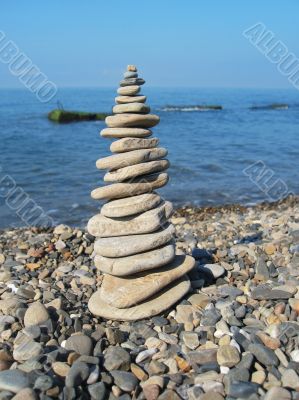 Balanced stones on the seashore
