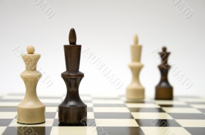 Chess queen and king - interracial marriage concept