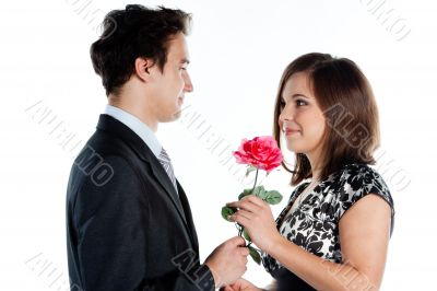 man gives a woman flowers
