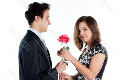 man gives a woman flowers